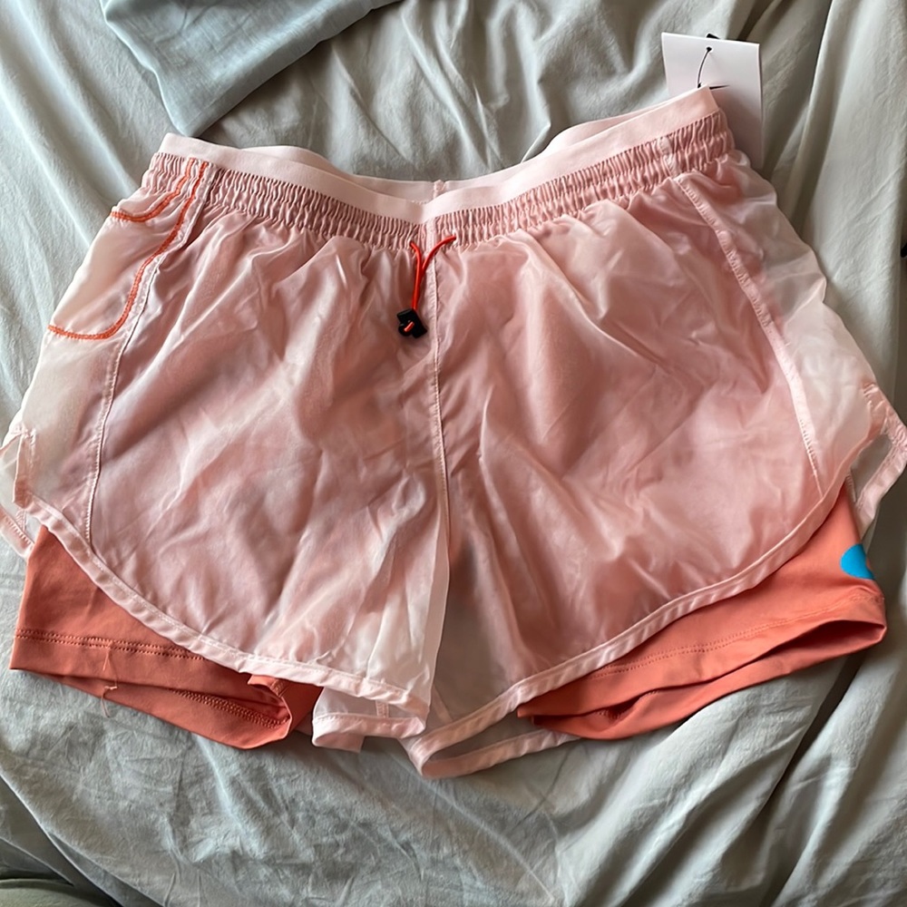 Nike running shorts with sewed in biker shorts